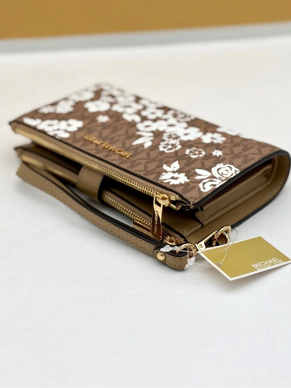 Michael Kors Brown & White Floral Logo Wristlet
